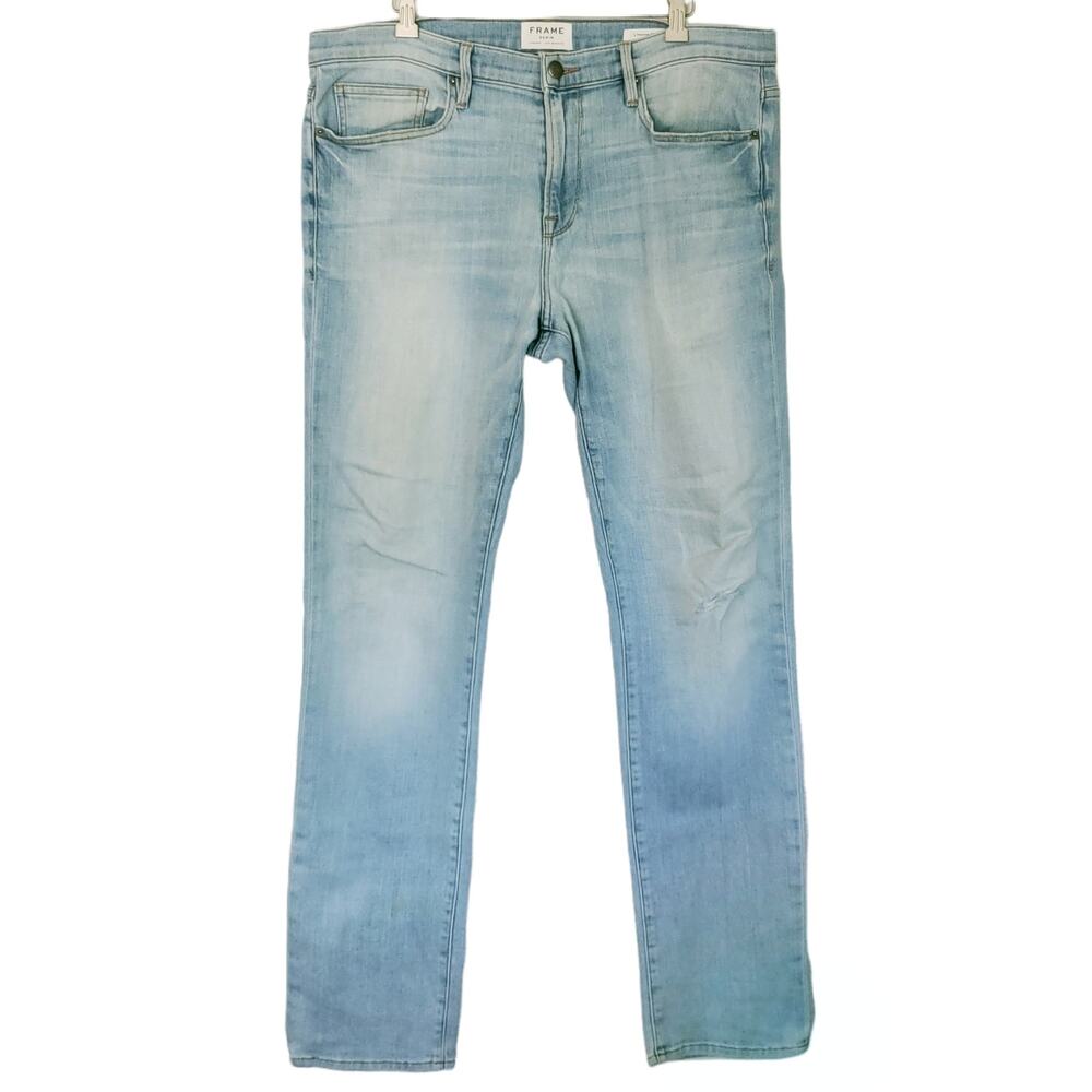 FRAME Denim L'Homme Slim fit distressed mid rise straight tapered jeans Finn 36